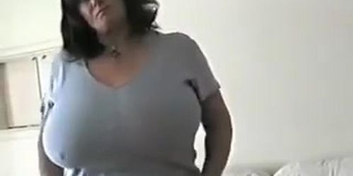 Busty granny MILF in crotchless stockings and huge boobs