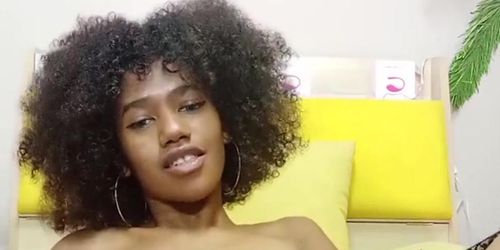 Curly Ebony with perfect natural tits and hairy pussy fucks a huge white dildo