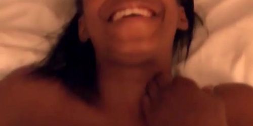 Horny black couple having good time inside the bedroom