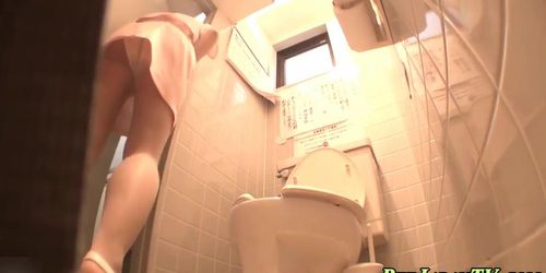Asian pees in public wc