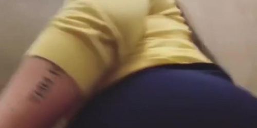 Who is this milf big butt Latina showing her ass up skirt in the office bathroom?