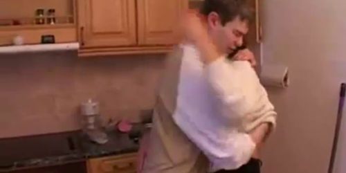 Stepmom and stepson have a sex on the kitchen