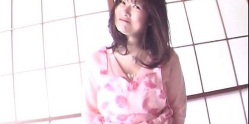 Sex starved Japanese tramp flaunting her huge tits and nipples