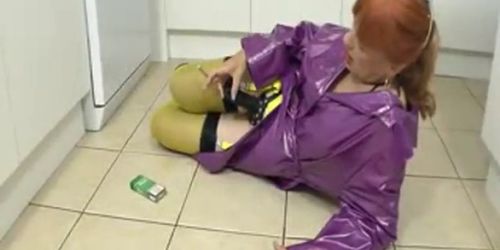 Abigirl in her purple pvc smoking amore120withstrapon