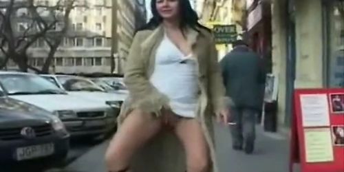 Exhibitionist brunette woman