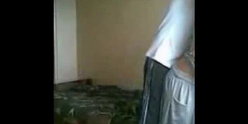 Asian kazakh girl with Russian guy in his room