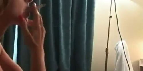Horny blonde chick smoking a sigarette part2