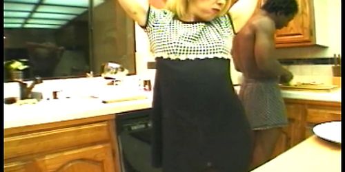 Black guy drills hot white chick in the kitchen