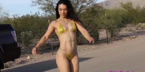 Fitness chick showing off with her curves