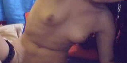 Hot Asian babe playing with a dildo