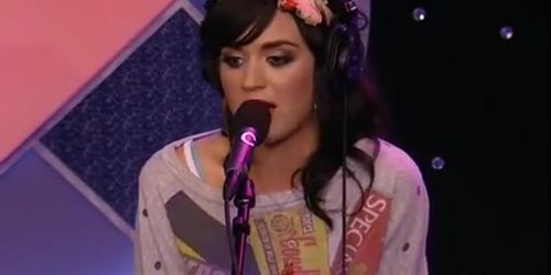 Katy Perry shows her cleavage to Howard Stern, asks Katy Perry to remove her sweater for cleavage (Krystal Boyd)