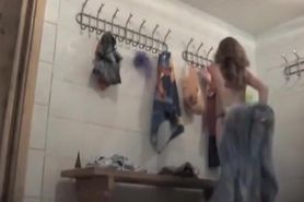 Girl strips before taking shower and then towels nude body