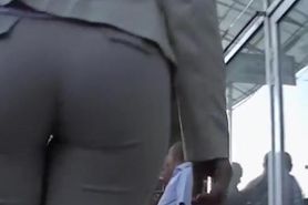 Booty in taut grey breeches