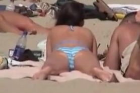 Candid voyeur girl in bikini lying with stretched legs 04t