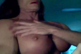 Musclelynn flexes her massive, oiled chest