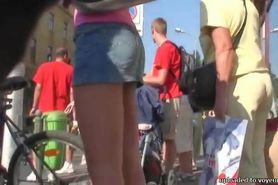 Street voyeur cam catches a scantly clad girl shopping