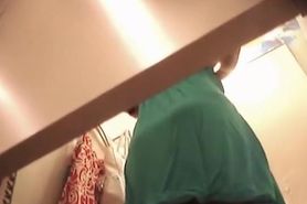 Girl trying on dress in change room gets upskirt spied