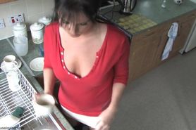 Free down blouse video of a hot girl washing dishes