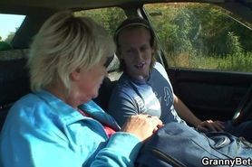 GRANNYBET - Old blonde hitchhiker doggy-fucked outside
