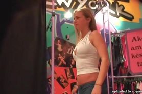 Hot blonde girl in a dressing room public spy cam video
