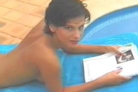 Rebekah Teasdale is naked by the pool