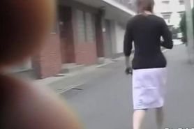 Sharking of graceful Japanese girl wearing a white skirt