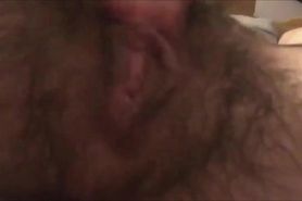 Stunnig hairy milf fingers her pussy - closeup