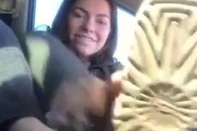 Cutie sucks on her toes in the car