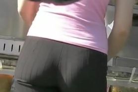 Tight pants girl in pink short gets a nice amateur voyeur cam shot