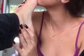 Licking her girlfriend feet