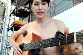 Basic twink Jaegyun Schwartz plays shitty guitar before letting his cock flop around