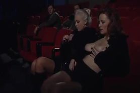 2 girls in a sex theater