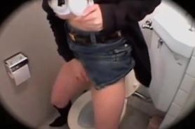 Lusty Japanese hoe fucked a massive dildo in a toilet
