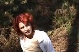 redhead wench receives exposed in the wood