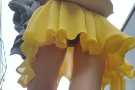 Slender Girl In A Yellow Dress