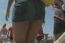 An upskirt spy cam shot of an arousing butt