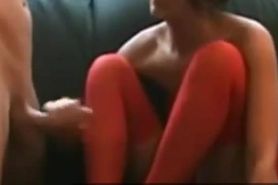 Cumming on her red socks