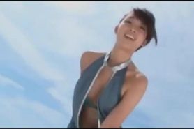 Sweet Japanese girl dancing on the beach (Non-Nude)