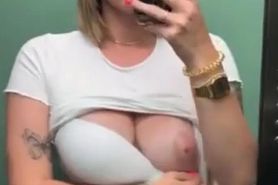 Flashing her boobs on the elevator