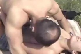 Hot bitch with short hair rides a dick with her ass outdoors