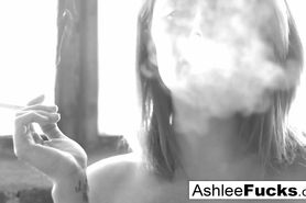 Busty Ashlee Graham smokes while showing off her natural tits