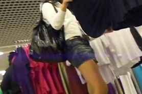Upskirt video of a chick with white panties in the department store