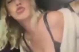 Spanish Thot with big boobs on the car