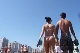 Hot ass in thong on the  beach