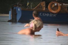 Fat amateur sits on beach voyeur cam with huge naked tits