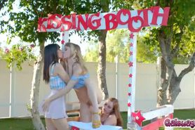 Ivy and Danni tongues each pussies at the kissing booth