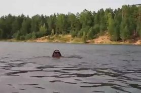 Hot Milf webcam swims pees and shows off while outdoors