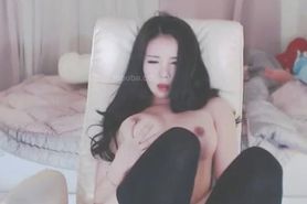 Korean BJ Neat masturbates in stockings