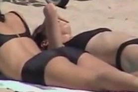 Girls in candid black bikinis spied on the crowded beach 07d