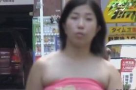 Perfect Japanese sweetie walking down her street during sharking scene
